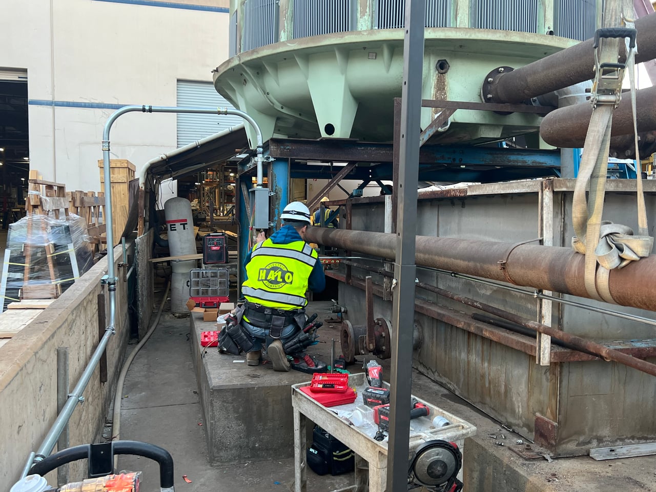 Halo Electric technician installing electrical power and conduit at the Trulite cooling tower in City of Industry
